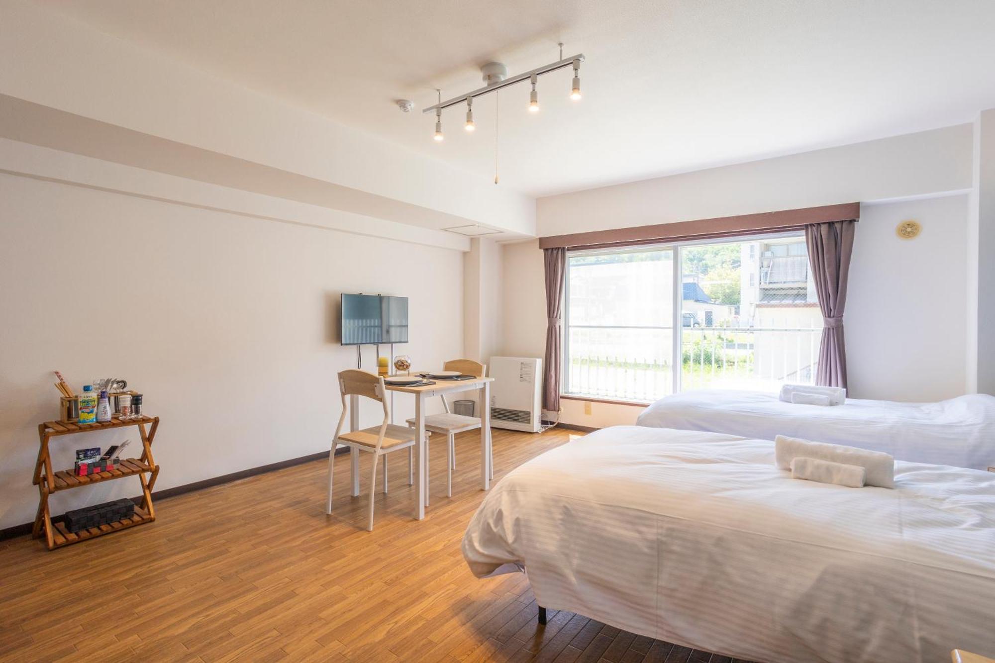 Apartamento レイクトーヤビルディング Toyako Exterior foto